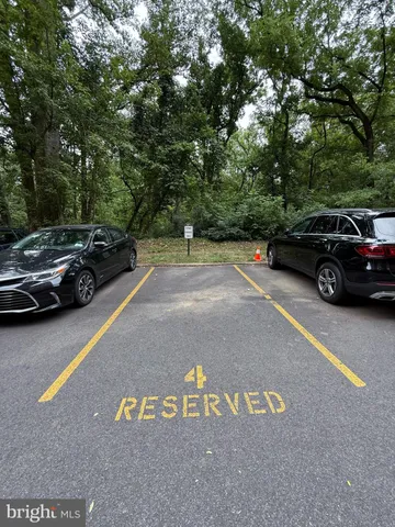a view of street with parked cars