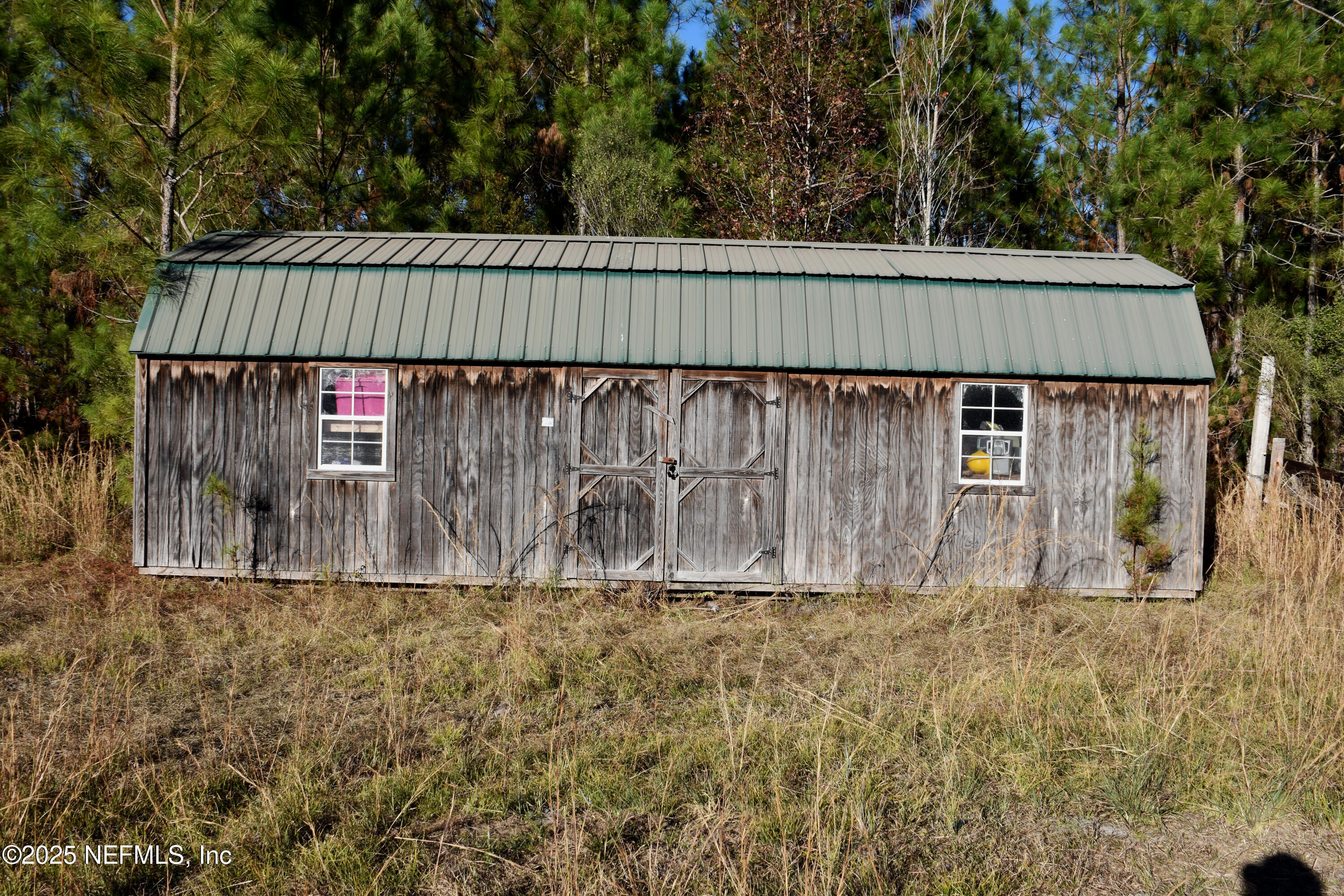 56695 Davis Road Callahan, FL 32011 - Photo 5 of 12 a view of wooden fence