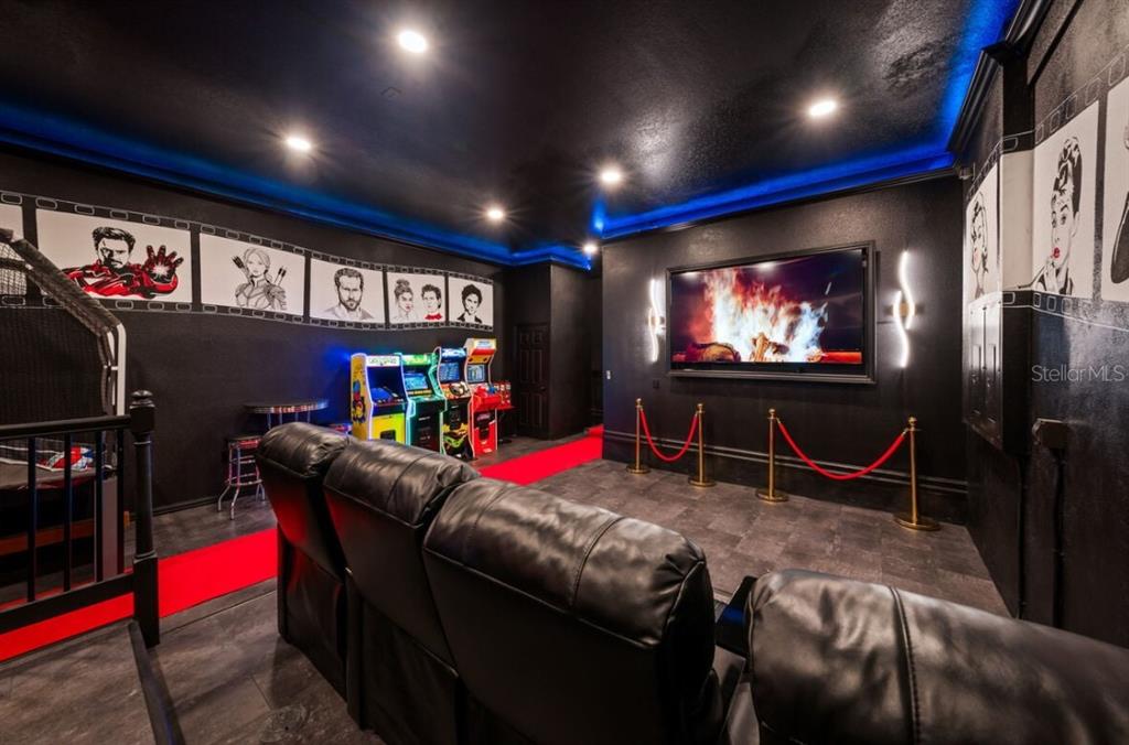 1227 Radiant Street Reunion, FL 34747 - Photo 33 of 70 a living room with furniture and a flat screen tv