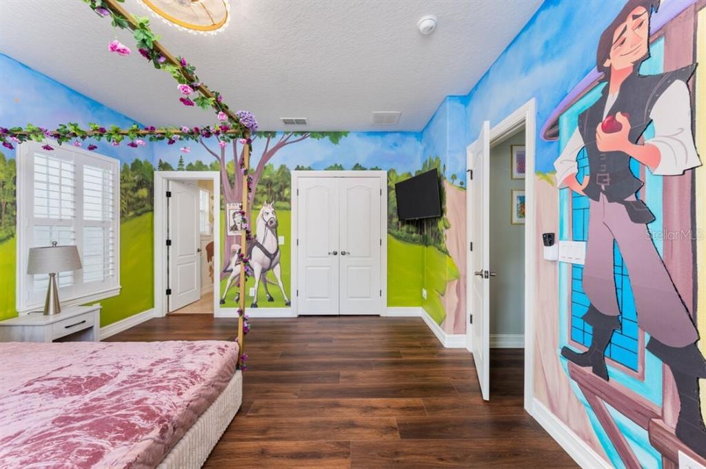 1227 Radiant Street Reunion, FL 34747 - Photo 46 of 70 a view of an entryway with wooden floor