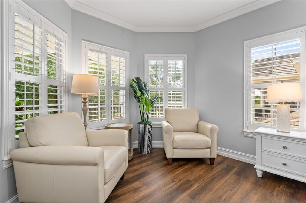 1227 Radiant Street Reunion, FL 34747 - Photo 54 of 70 a living room with furniture and windows