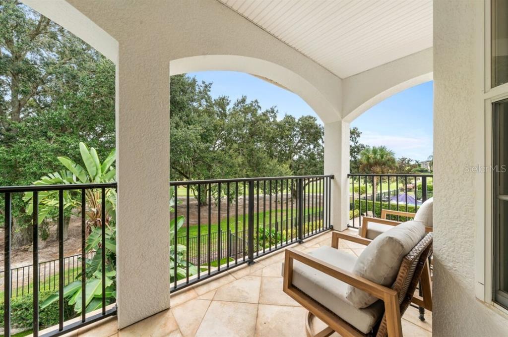 1227 Radiant Street Reunion, FL 34747 - Photo 60 of 70 a balcony with furniture and wooden deck