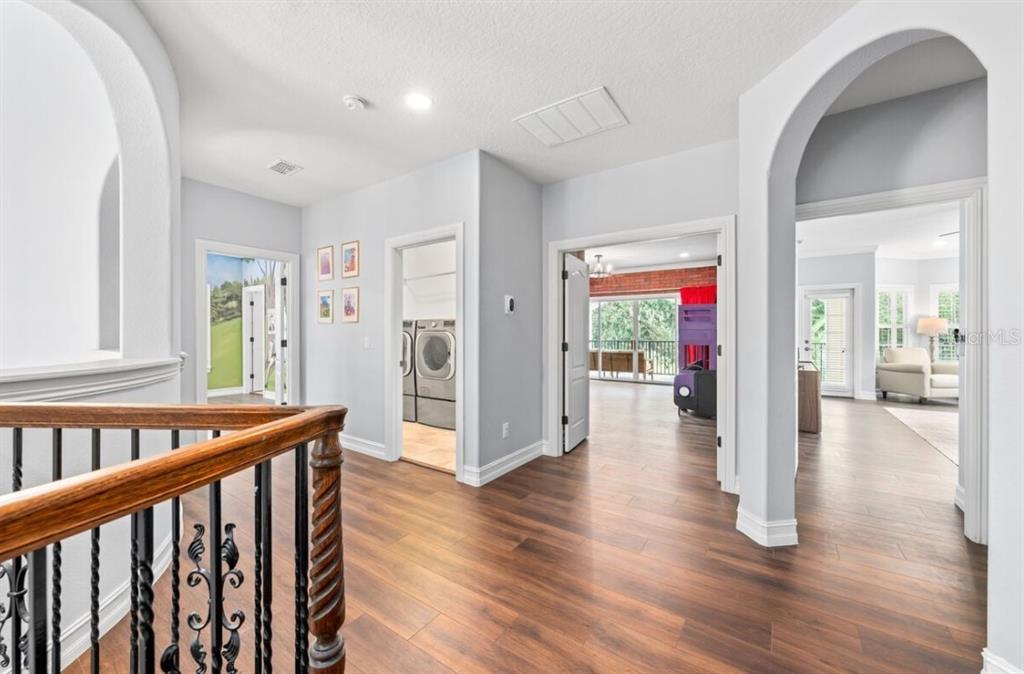 1227 Radiant Street Reunion, FL 34747 - Photo 68 of 70 a view of interior space with wooden floor and windows