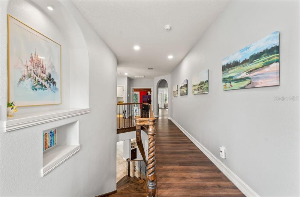 1227 Radiant Street Reunion, FL 34747 - Photo 69 of 70 a living room with furniture and a painting