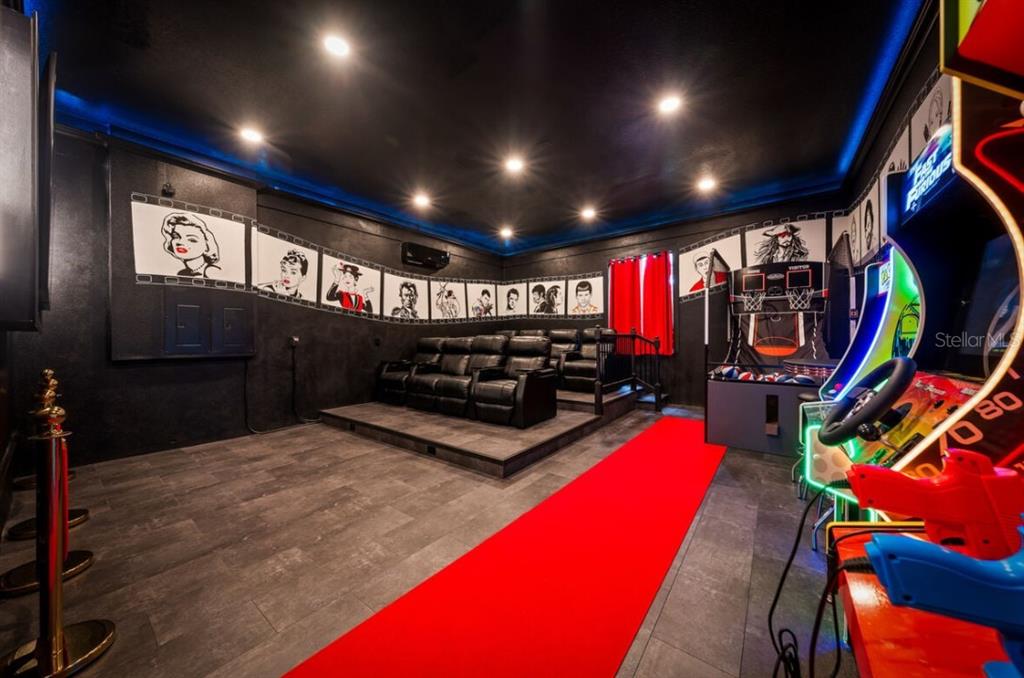 1227 Radiant Street Reunion, FL 34747 - Photo 7 of 70 a view of a room with gym equipment