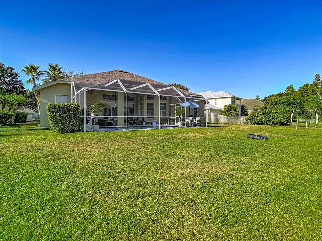 4805 Tea Rose Court Lutz, FL 33558 - Photo 48 of 59 a view of a house with a big yard
