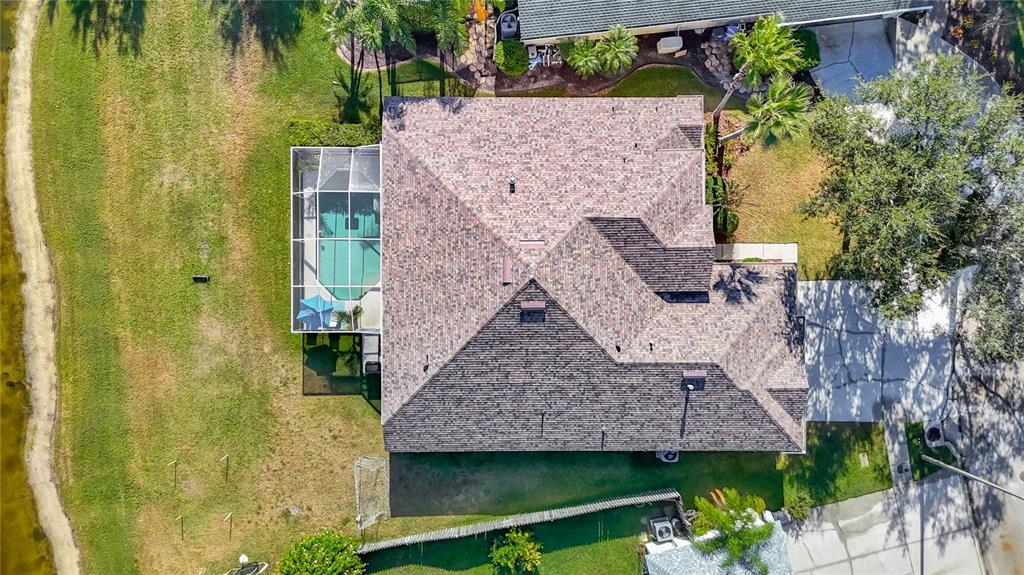 4805 Tea Rose Court Lutz, FL 33558 - Photo 52 of 59 an aerial view of a house with a garden