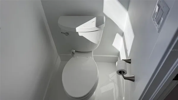 a bathroom with a toilet and a sink