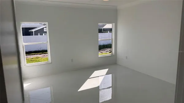 a view of an empty room with window