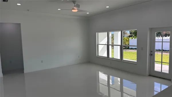 an empty room with windows