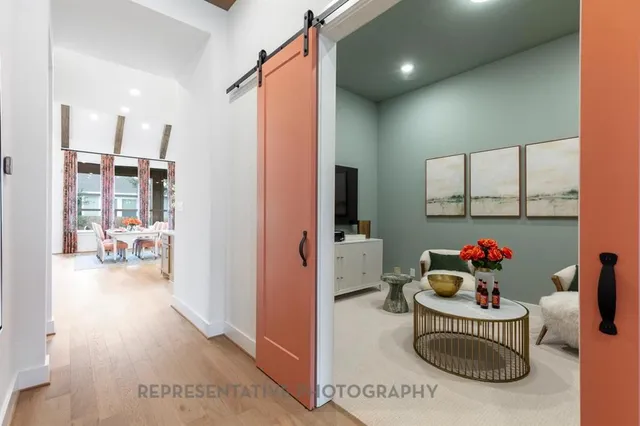 a bathroom with a sink mirror and vanity