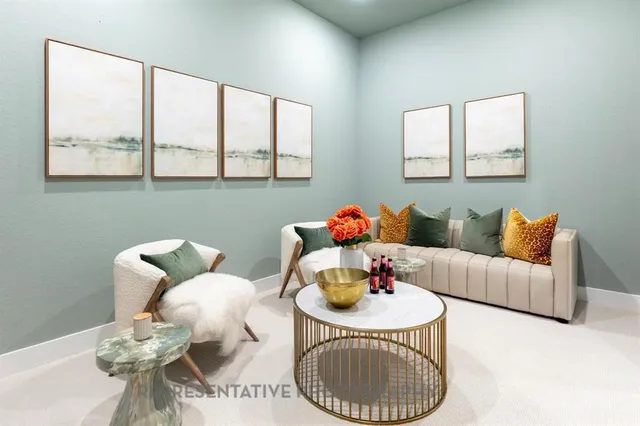 a lobby with furniture and floor to ceiling window