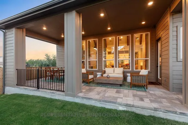 a outdoor living space with furniture and garden view