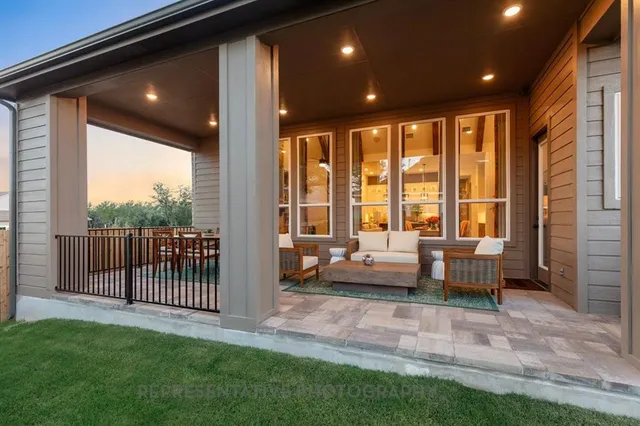 a outdoor living space with furniture and garden view
