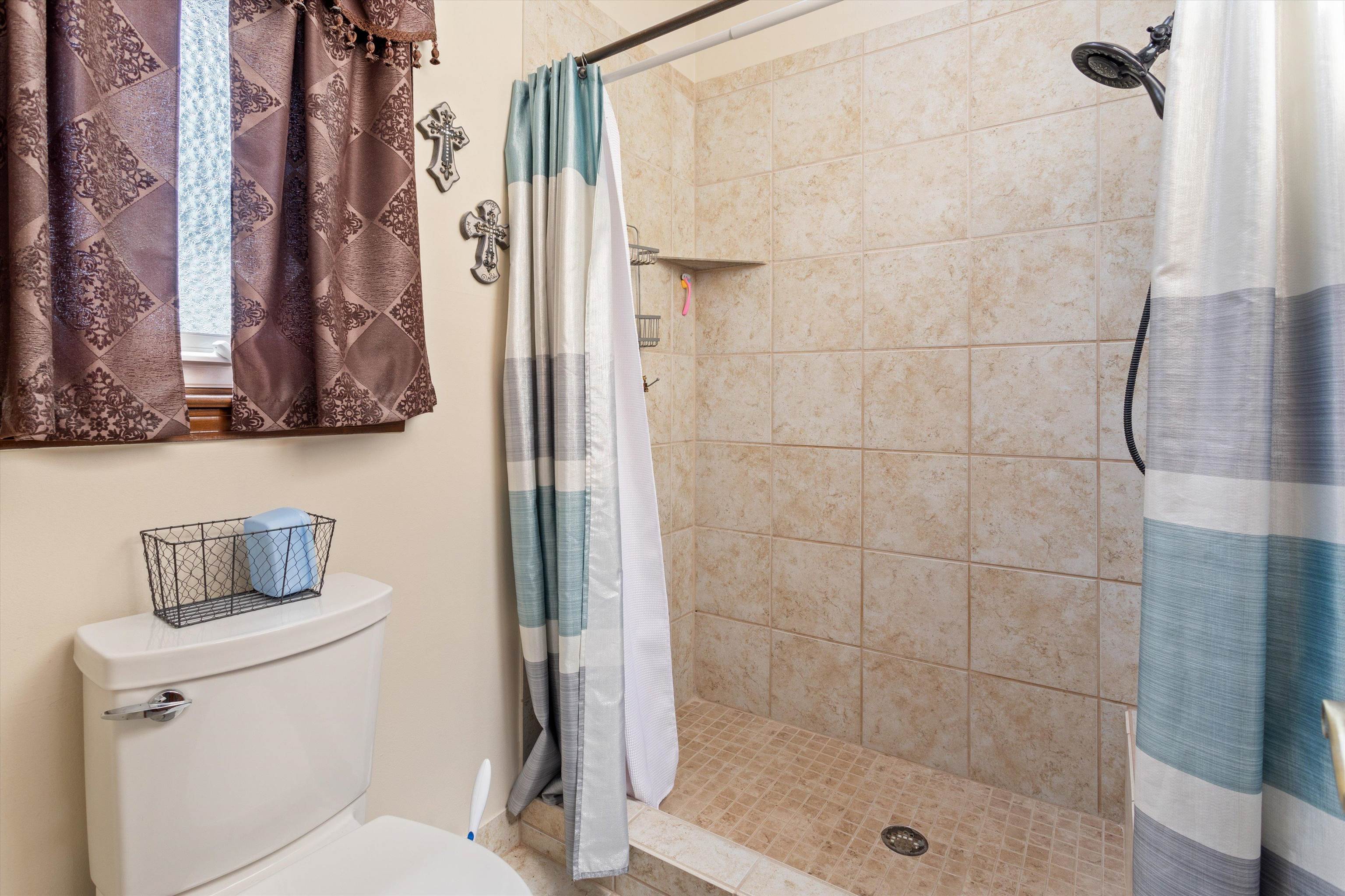 509 Shelton Road Collierville, TN 38017 - Photo 14 of 21 a bathroom with a shower a toilet and sink