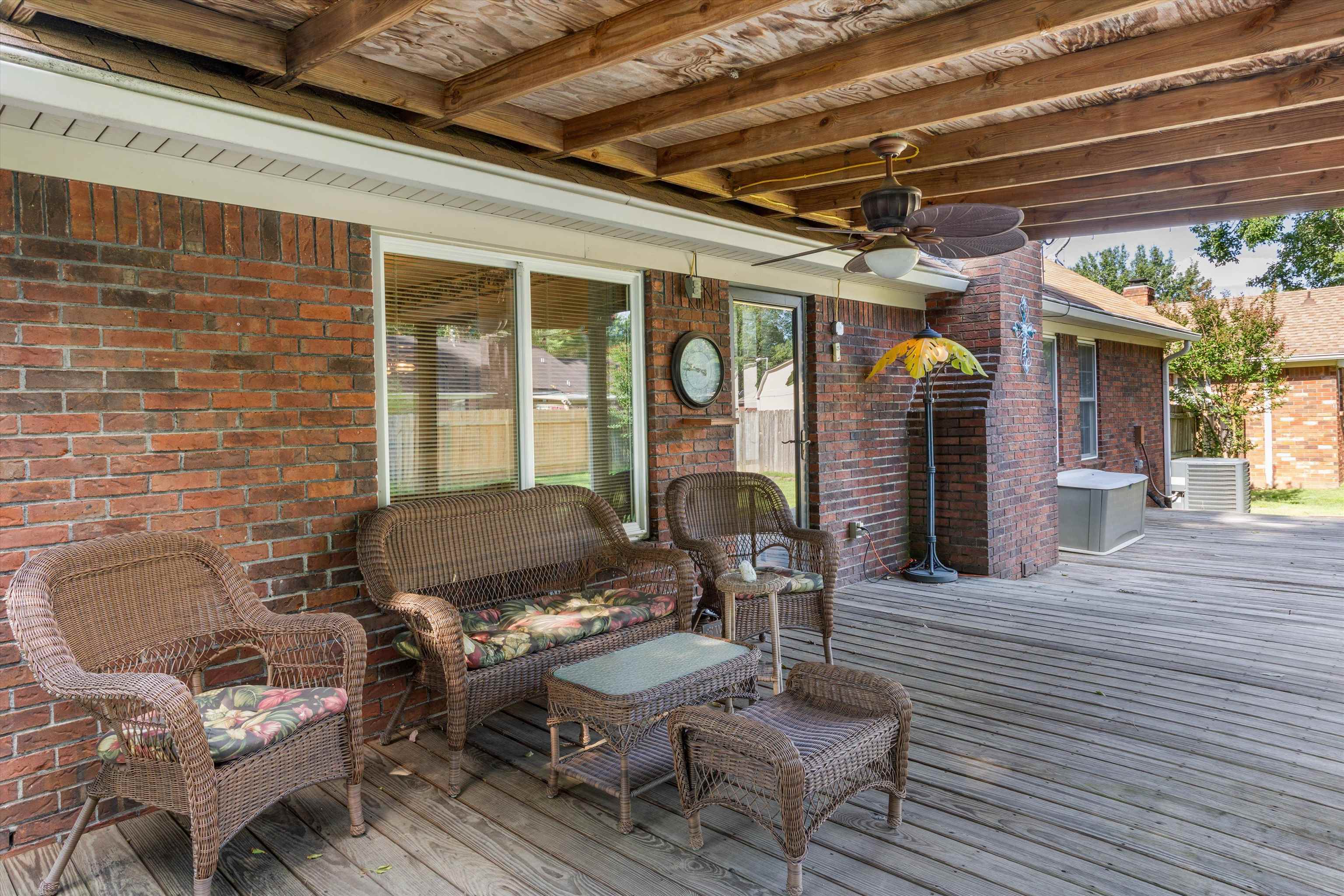 509 Shelton Road Collierville, TN 38017 - Photo 19 of 21 a outdoor living space with furniture and a fireplace