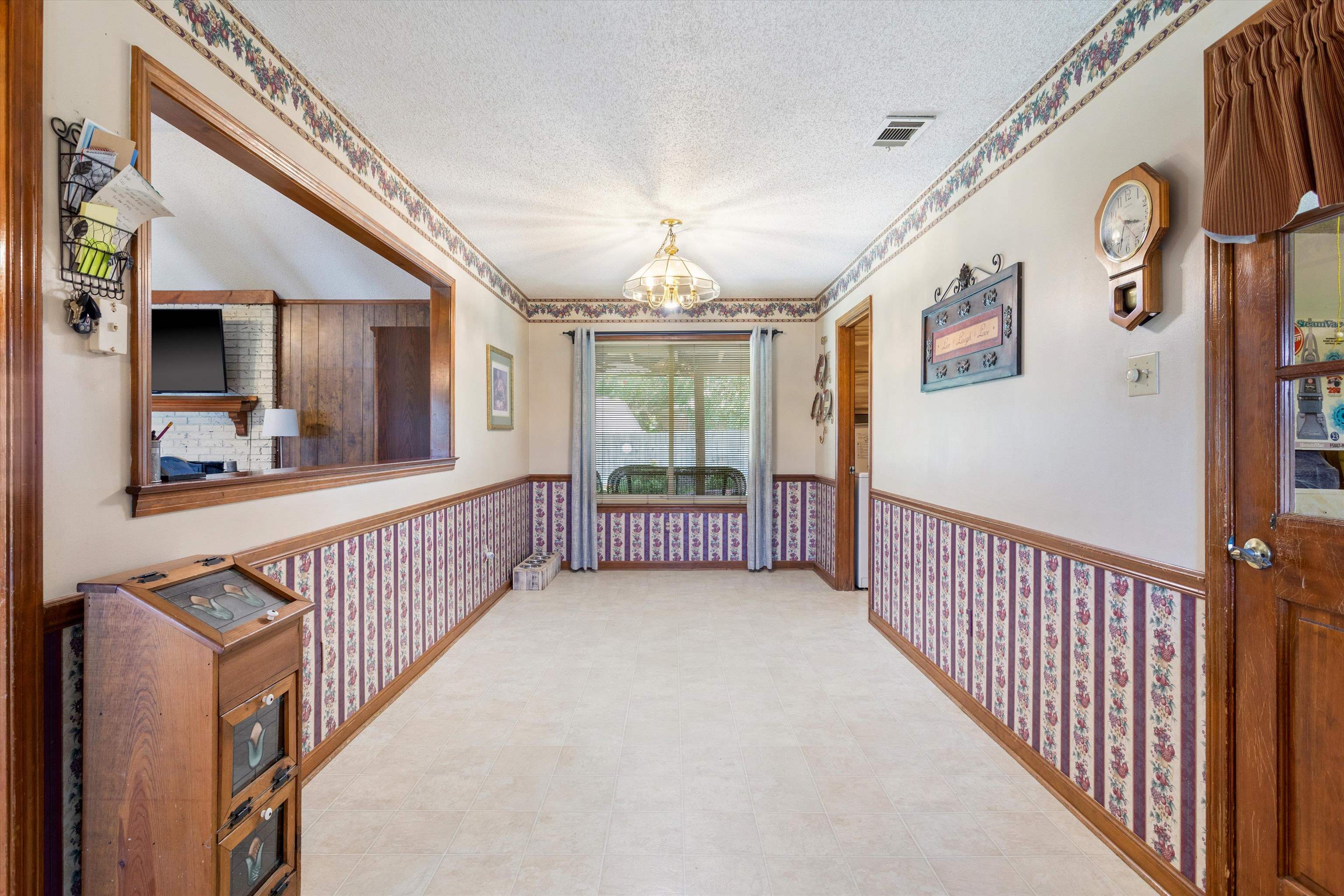 509 Shelton Road Collierville, TN 38017 - Photo 10 of 21 a view of a porch with wooden floor and windows