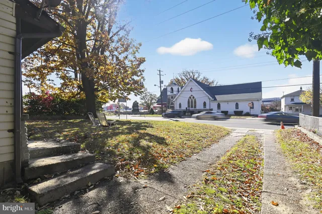 a house with trees in front of it