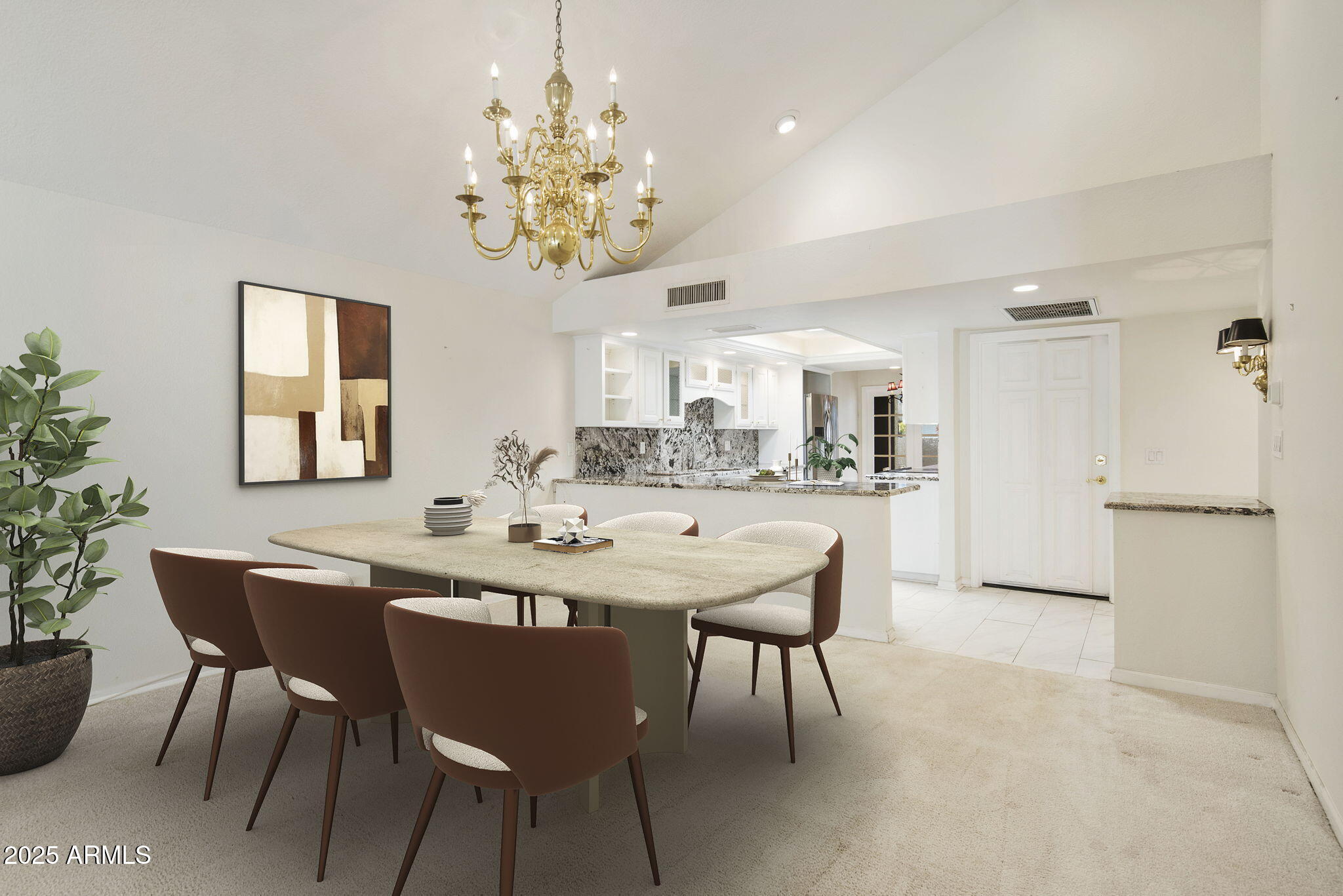 a view of a dining room with furniture and chandelier