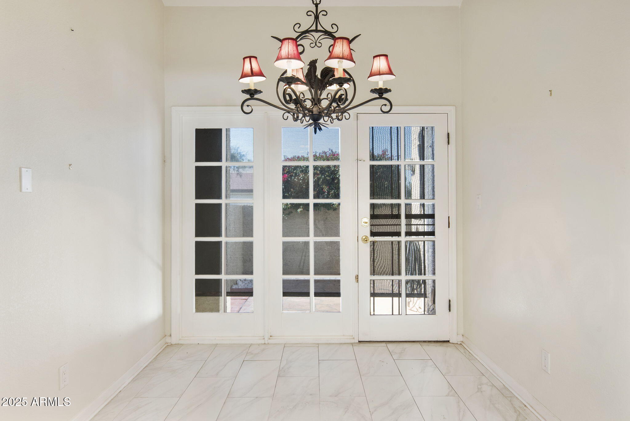 7365 East Valley View Road Scottsdale, AZ 85250 - Photo 14 of 45 a view of a room with windows and chandelier