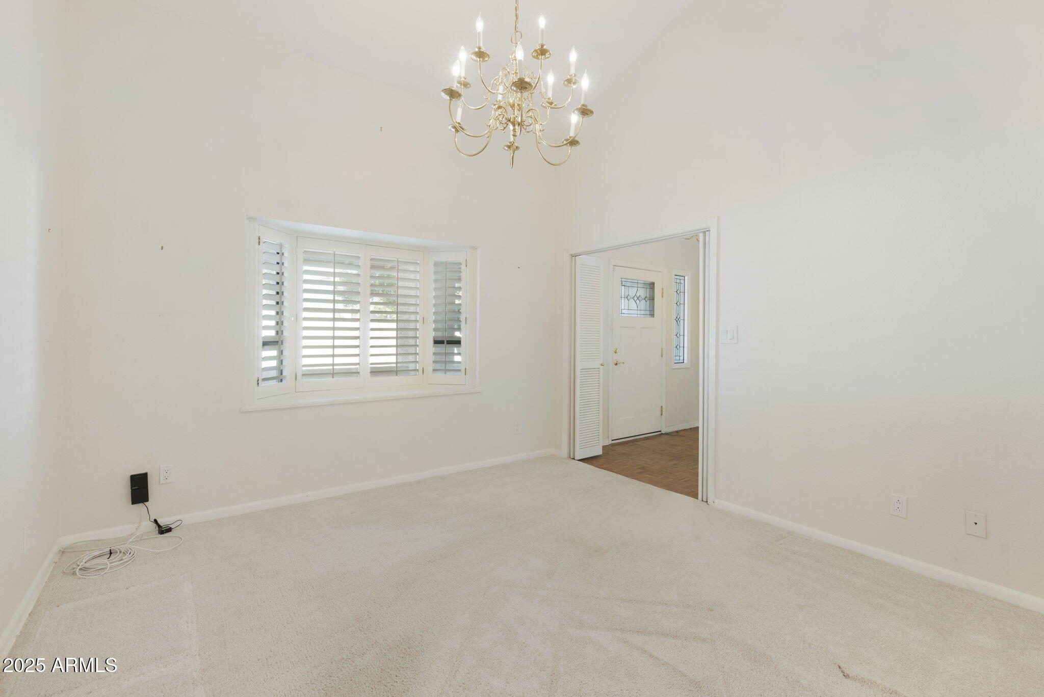 7365 East Valley View Road Scottsdale, AZ 85250 - Photo 16 of 45 a view of an empty room with a window