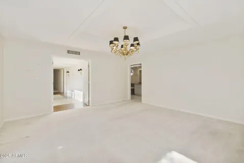 a bathroom with a double vanity sink mirror and shower