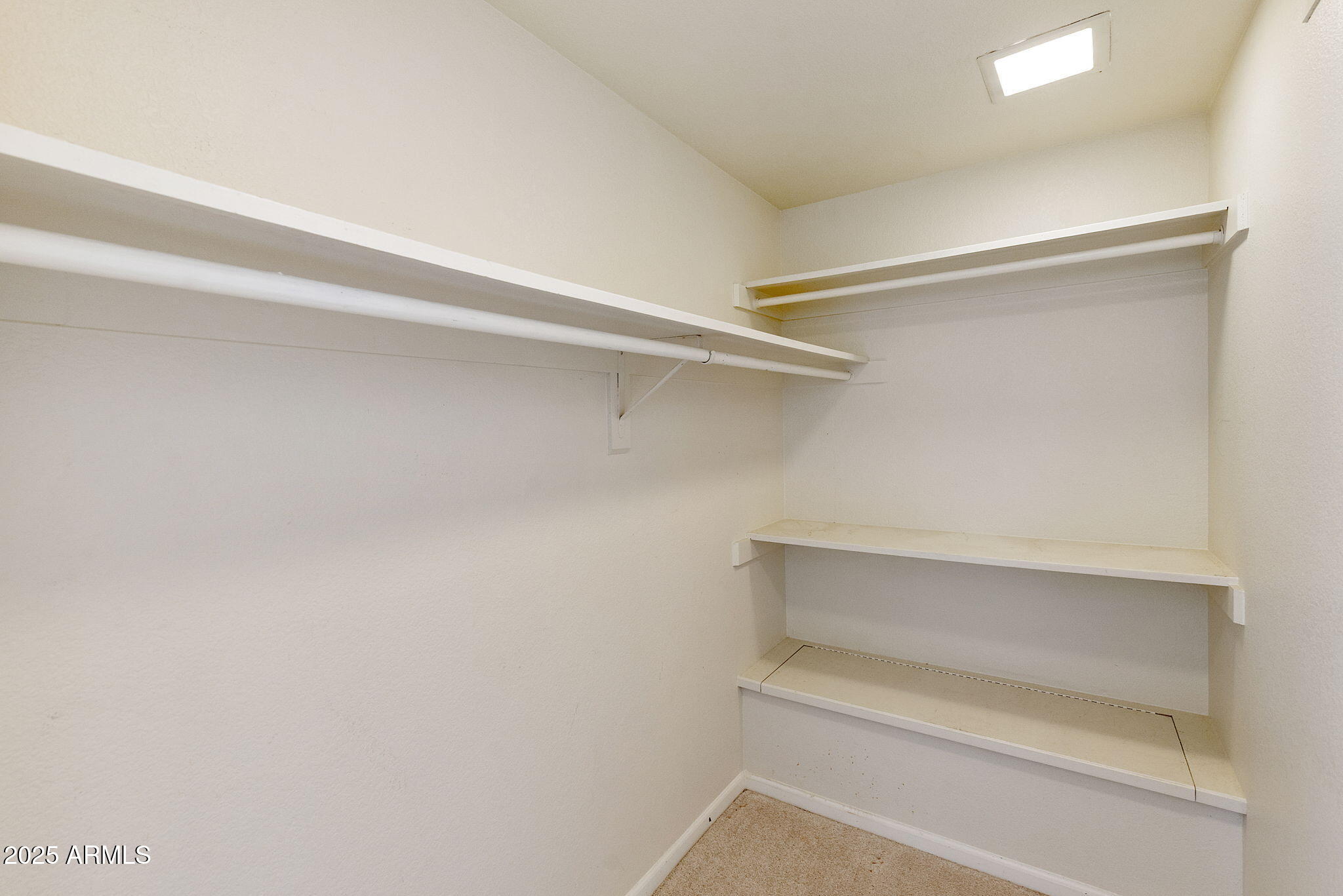 7365 East Valley View Road Scottsdale, AZ 85250 - Photo 27 of 45 a storage room with empty racks