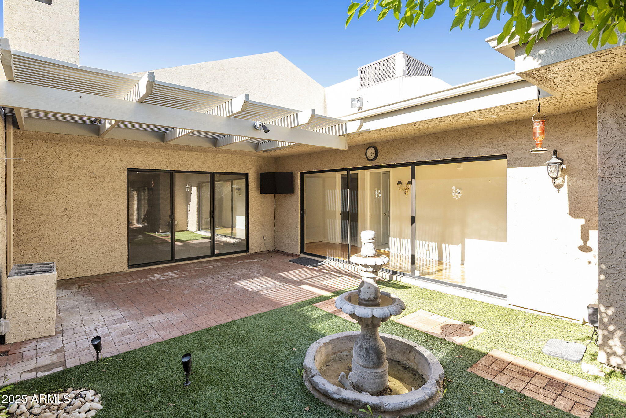 7365 East Valley View Road Scottsdale, AZ 85250 - Photo 31 of 45 a swimming pool with outdoor seating and yard