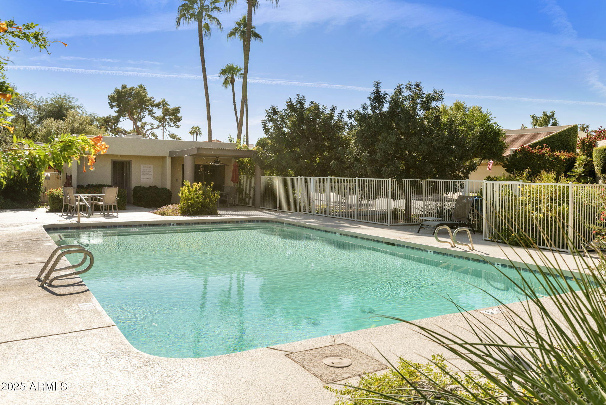 7365 East Valley View Road Scottsdale, AZ 85250 - Photo 43 of 45 a swimming pool with outdoor seating and yard