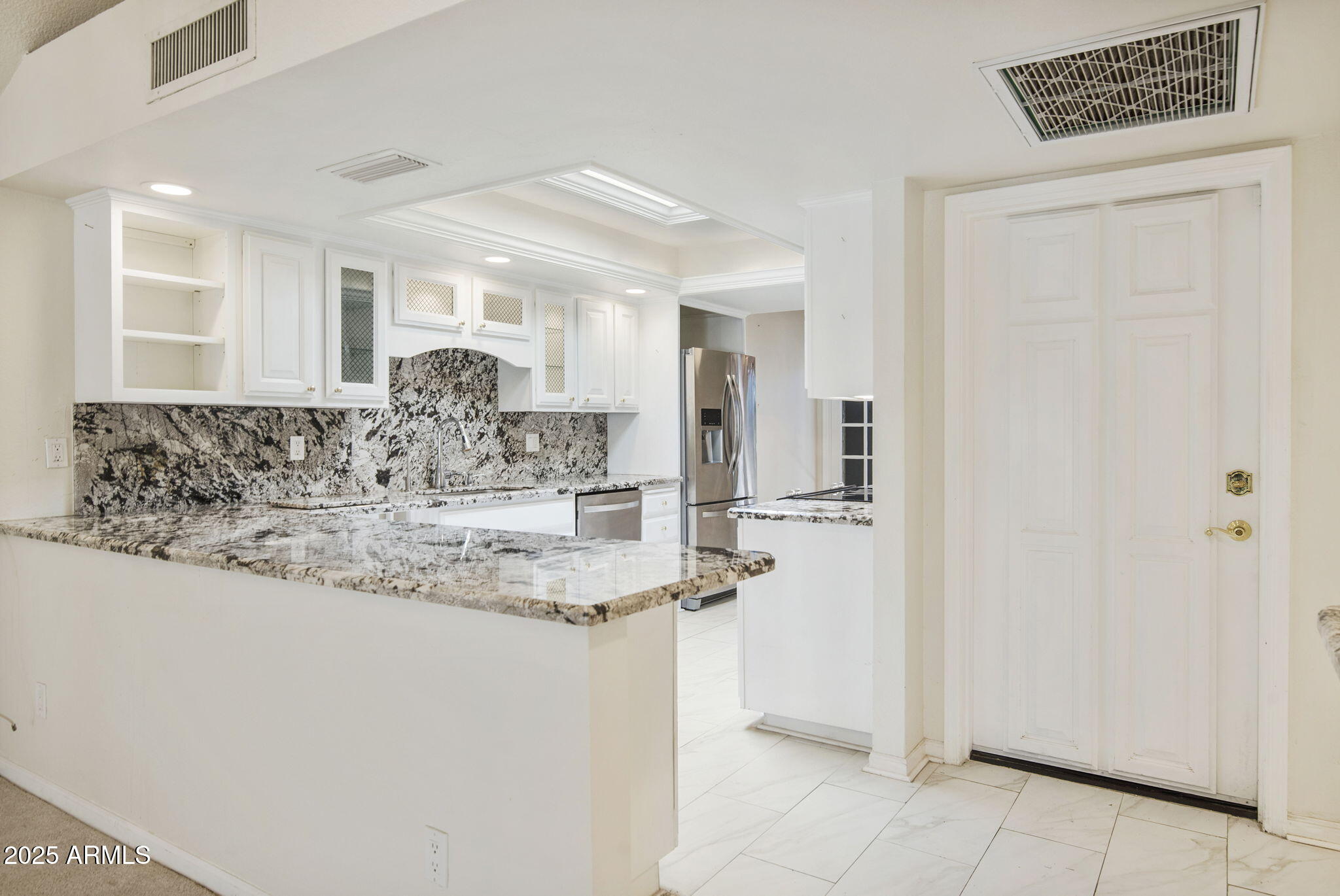 7365 East Valley View Road Scottsdale, AZ 85250 - Photo 7 of 45 a bathroom with a granite countertop sink and a mirror