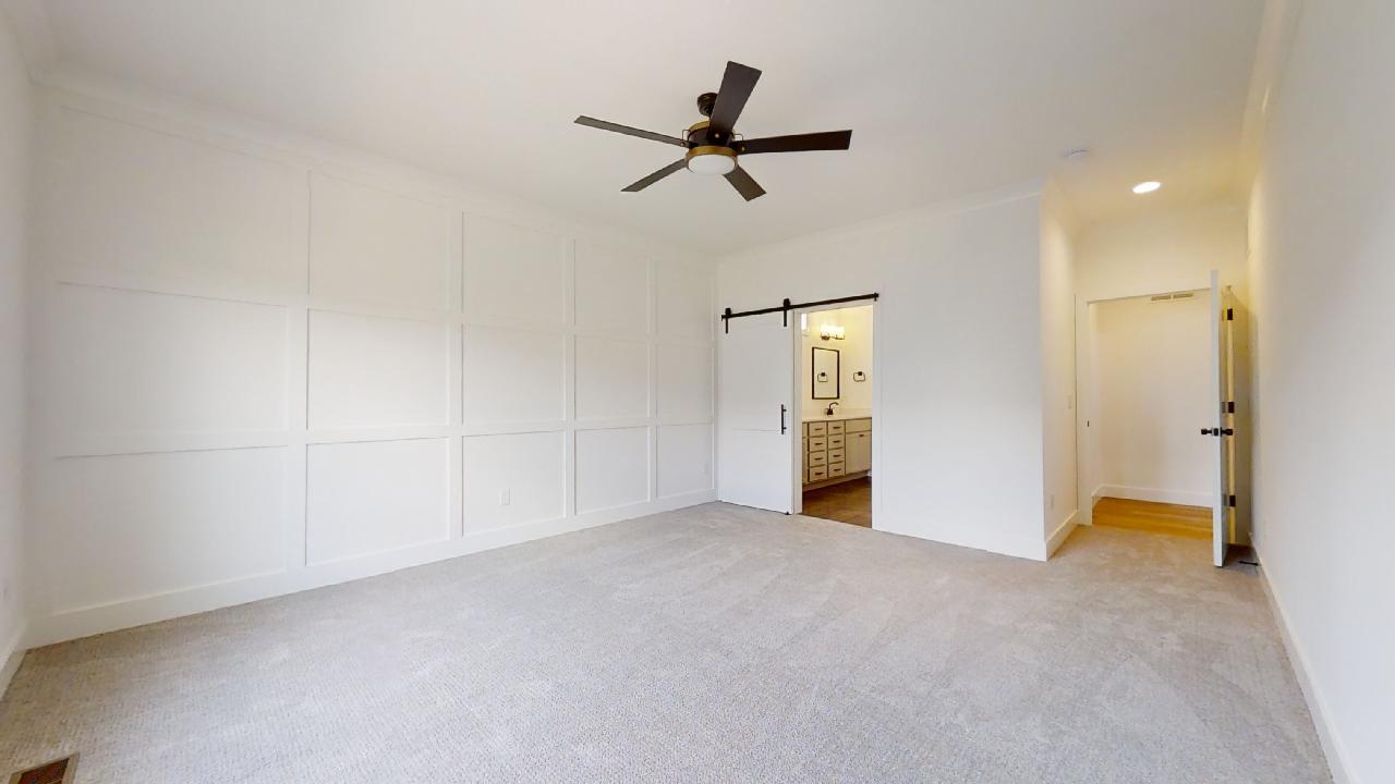 3910 Bay Circle Champaign, IL 61822 - Photo 17 of 49 a view of a livingroom with a ceiling fan and closet area