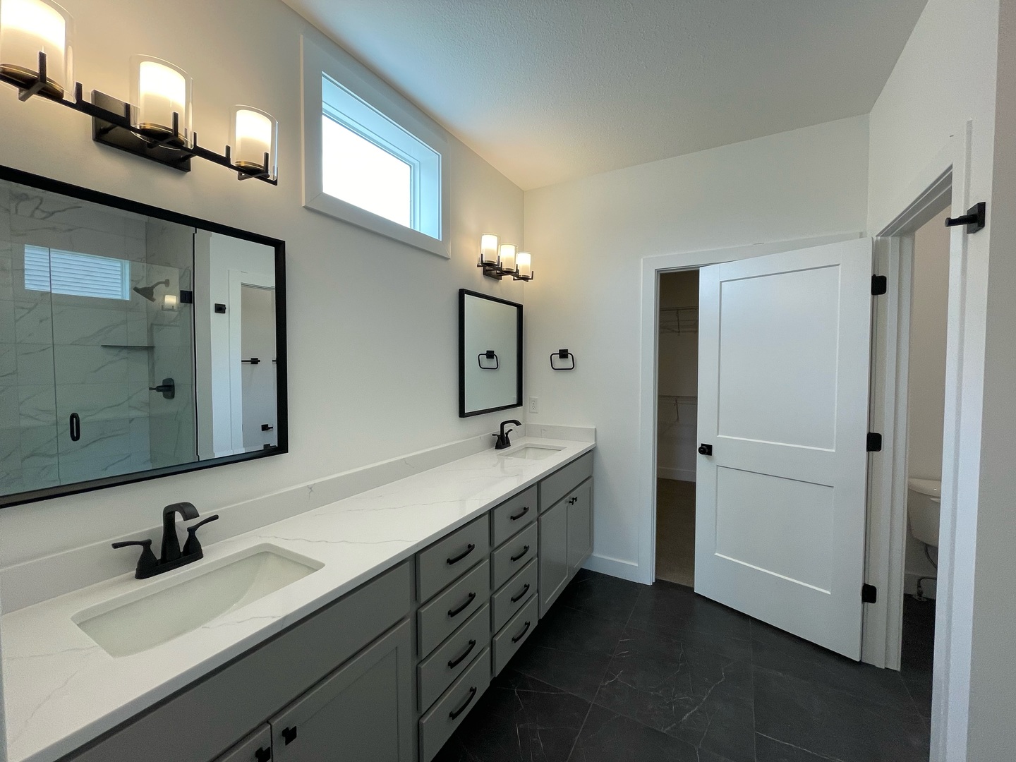 3910 Bay Circle Champaign, IL 61822 - Photo 20 of 49 a bathroom with a double vanity sink and mirror