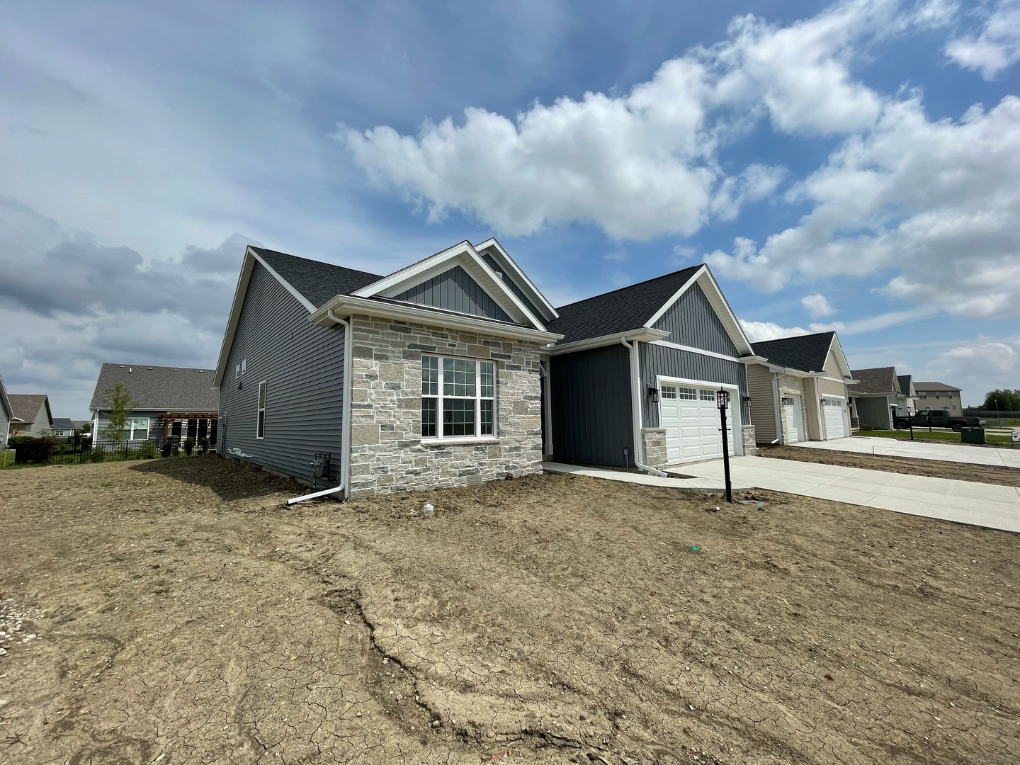 3910 Bay Circle Champaign, IL 61822 - Photo 2 of 49 a view of a house with a yard
