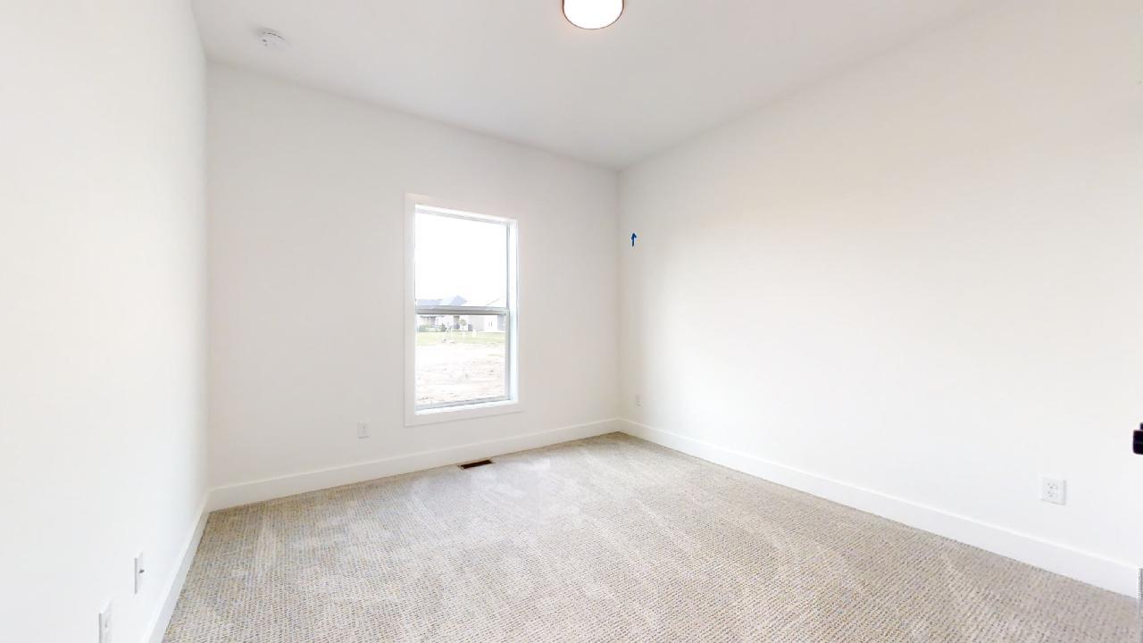 3910 Bay Circle Champaign, IL 61822 - Photo 26 of 49 an empty room with a window