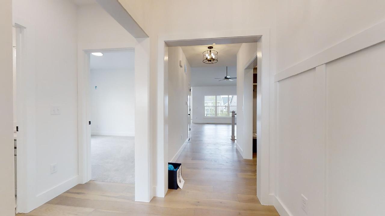 3910 Bay Circle Champaign, IL 61822 - Photo 3 of 49 a view of a hallway with wooden floor