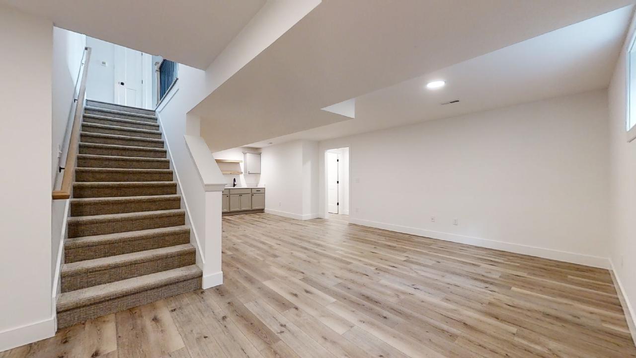 3910 Bay Circle Champaign, IL 61822 - Photo 34 of 49 wooden floor in an empty room with a window