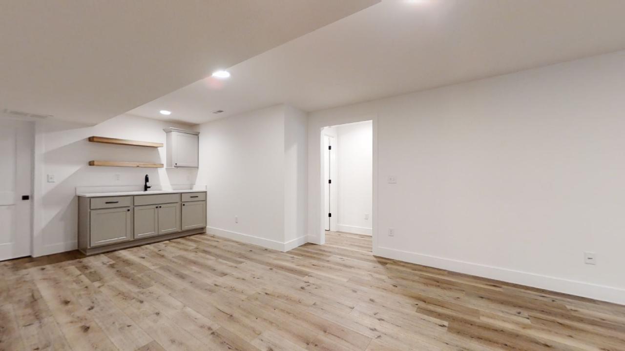 3910 Bay Circle Champaign, IL 61822 - Photo 38 of 49 a view of a kitchen with a sink and a refrigerator