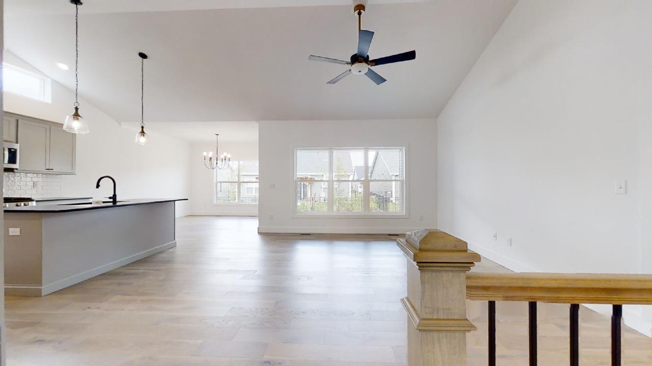 3910 Bay Circle Champaign, IL 61822 - Photo 4 of 49 a view of a kitchen with a sink and wooden floor