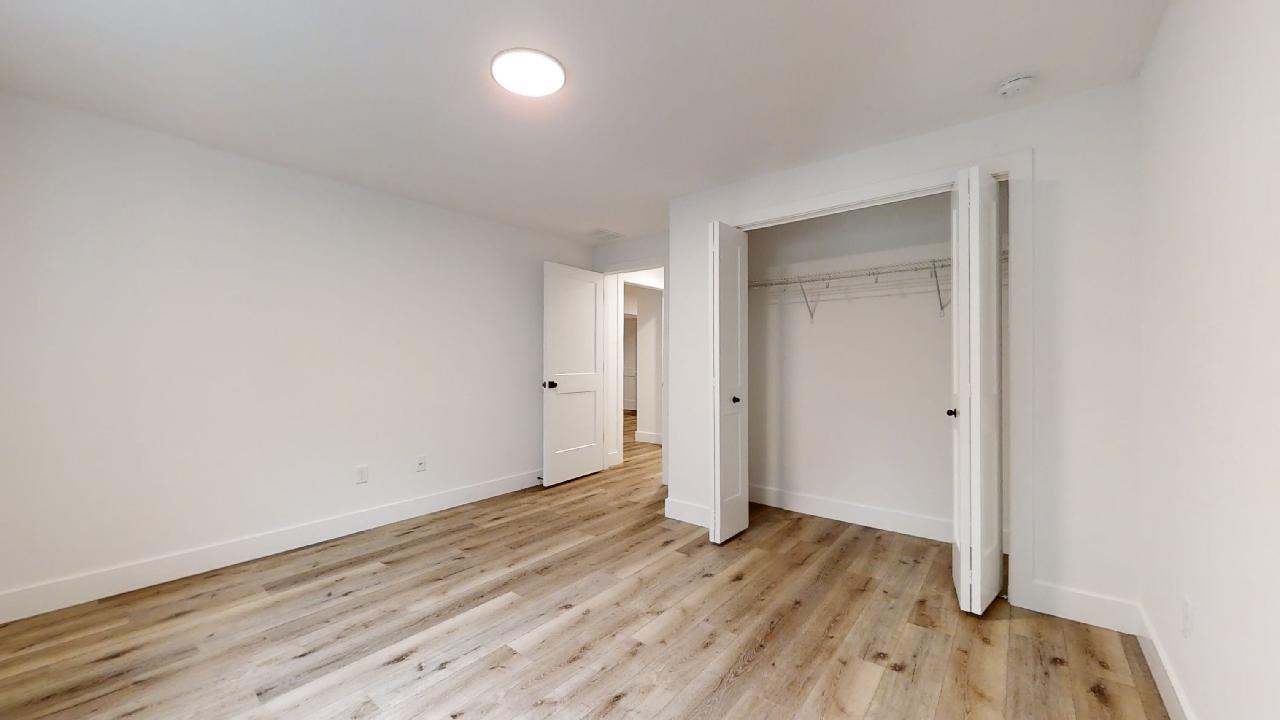 3910 Bay Circle Champaign, IL 61822 - Photo 41 of 49 a view of an empty room with wooden floor and closet