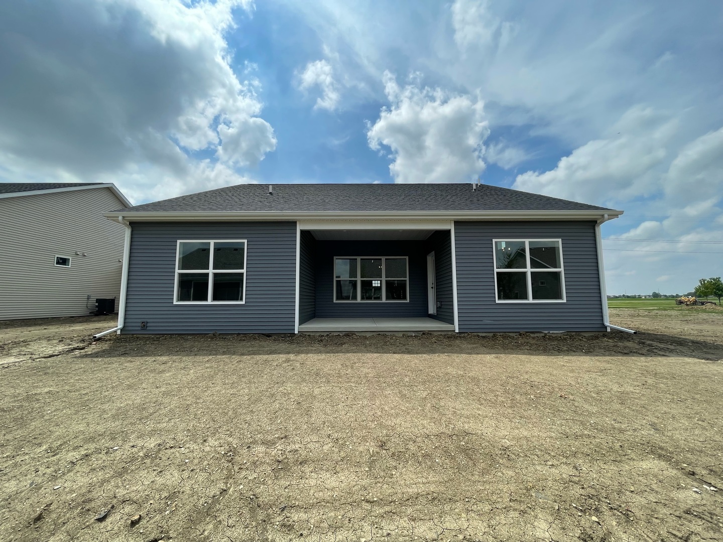 3910 Bay Circle Champaign, IL 61822 - Photo 44 of 49 a view of a house with backyard and a tree