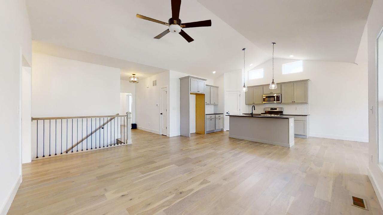 3910 Bay Circle Champaign, IL 61822 - Photo 6 of 49 a view of kitchen with refrigerator microwave and stove