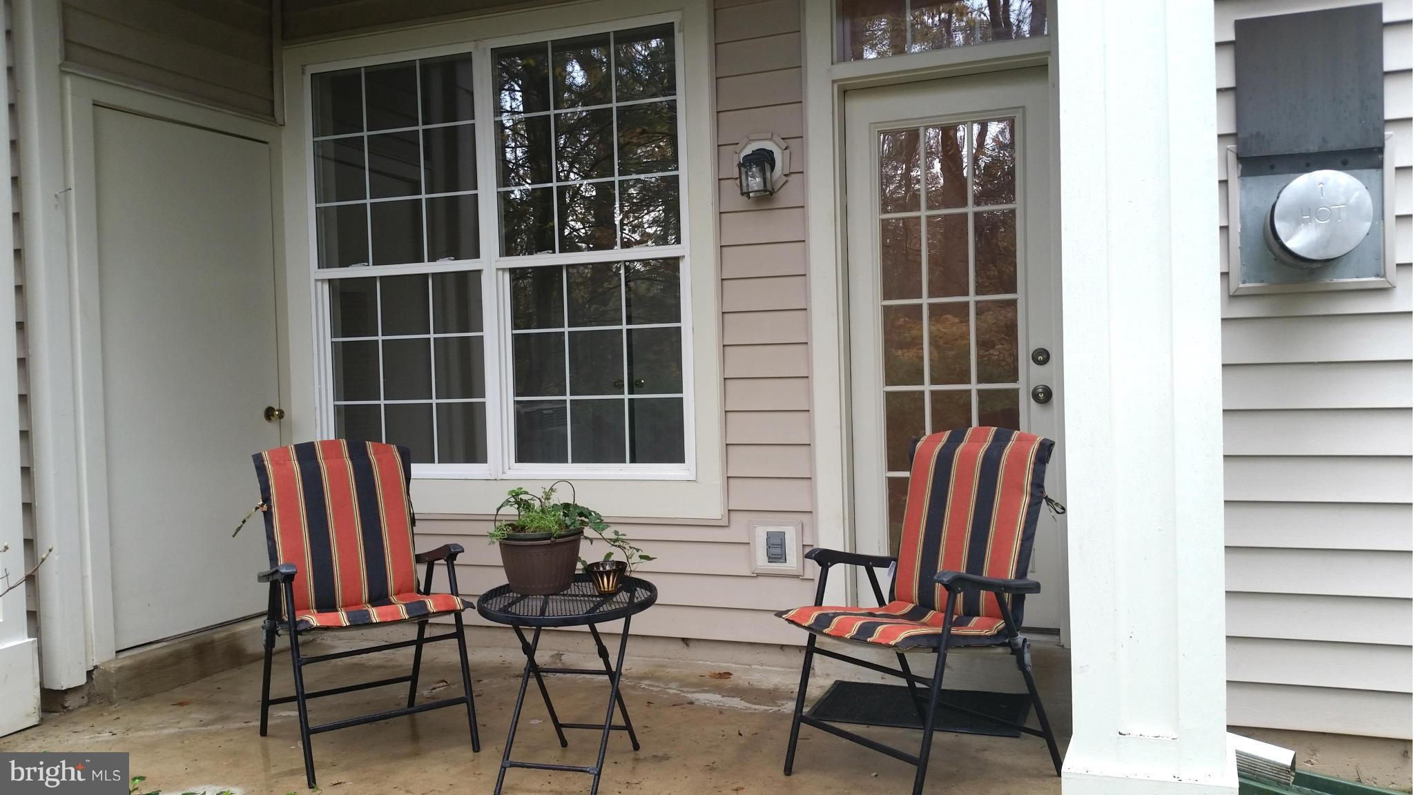 1305 Windleaf Drive, Unit G Reston, VA 20194 - Photo 12 of 27 Living Room Patio