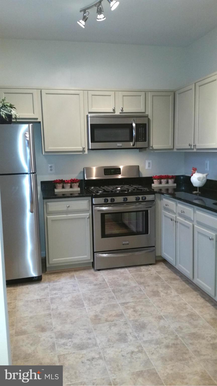 1305 Windleaf Drive, Unit G Reston, VA 20194 - Photo 5 of 27 New SS Appliances, Granite, Lighting & Flooring