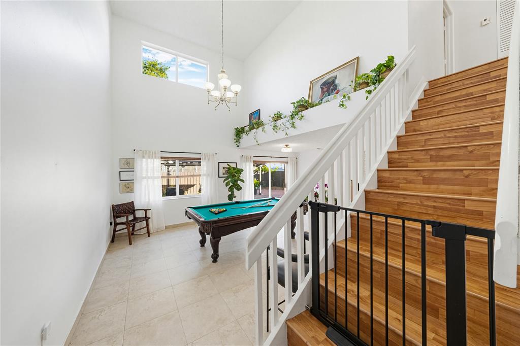 14277 Southwest 177th Street Miami, FL 33177 - Photo 18 of 38 a view of entryway and workspace