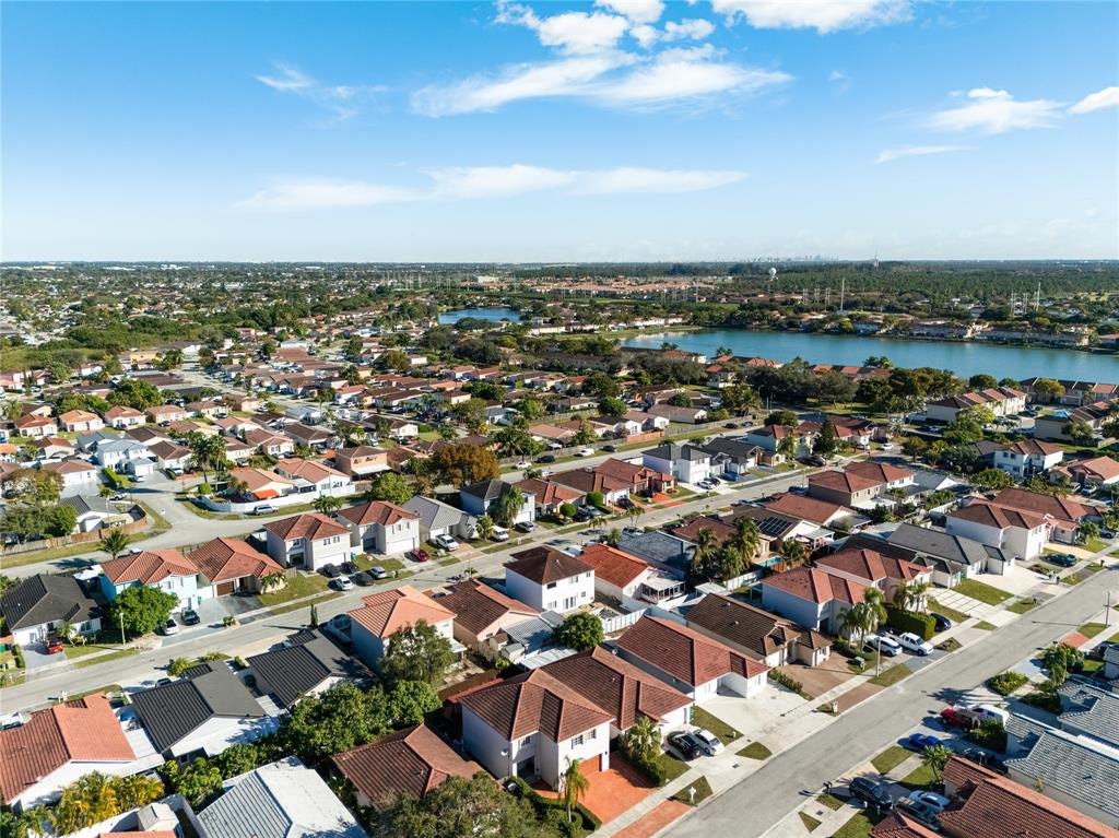 14277 Southwest 177th Street Miami, FL 33177 - Photo 38 of 38 an aerial view of residential building with parking space