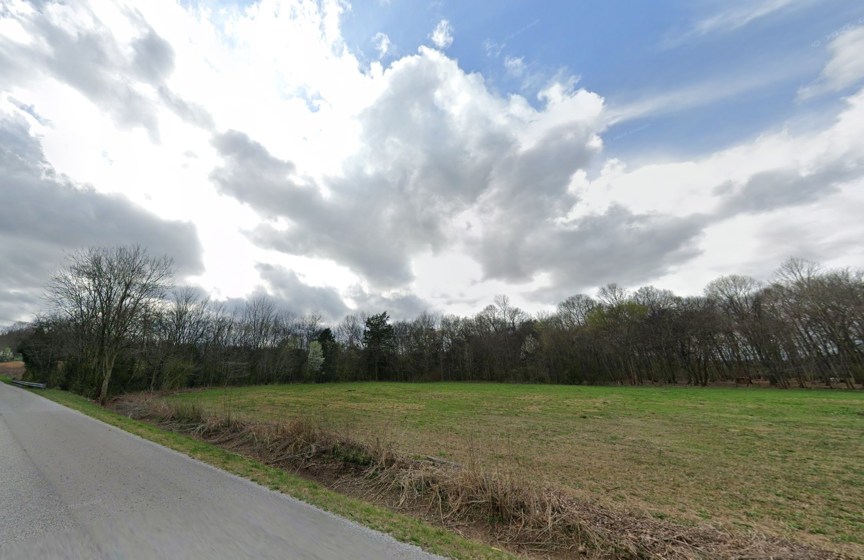 0 Hickory Grove Road Morrison, TN 37357 - Photo 2 of 3 a view of a field with trees in background