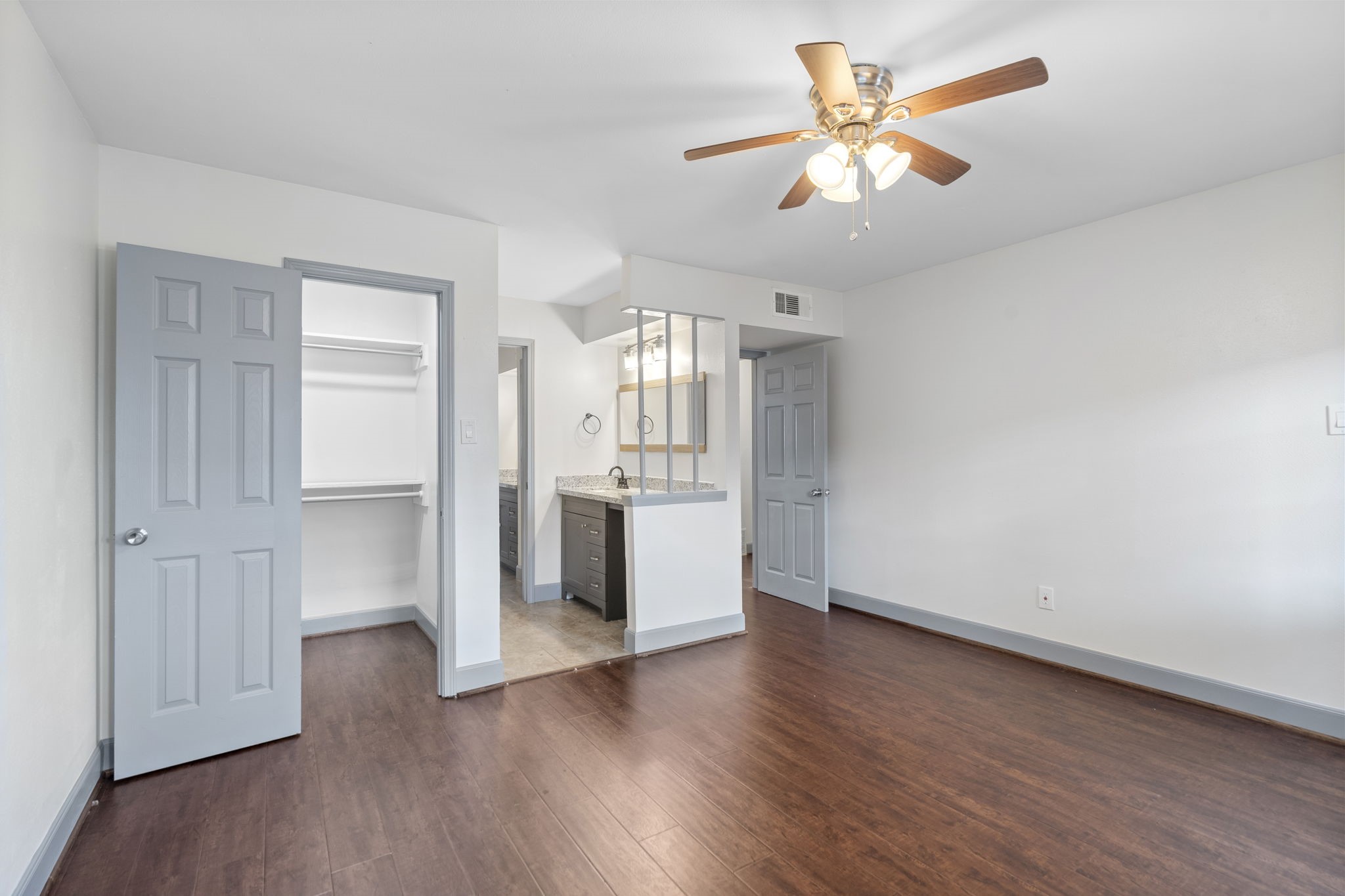 1271 Witte Road, Unit 26 Houston, TX 77055 - Photo 16 of 27 a view of a kitchen with a sink and a chandelier fan