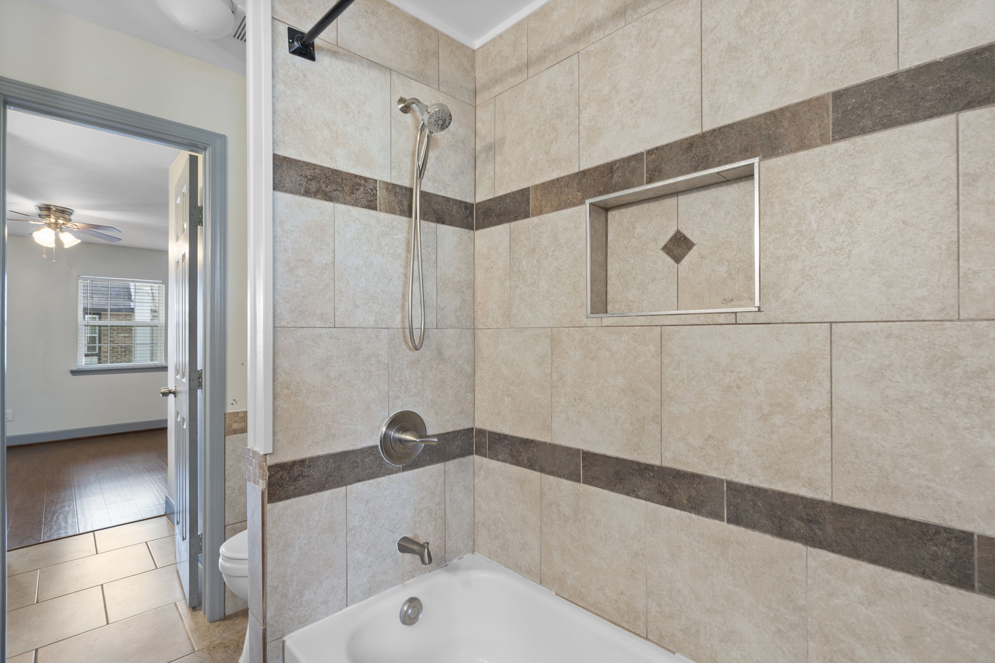 1271 Witte Road, Unit 26 Houston, TX 77055 - Photo 21 of 27 a bathroom with a bathtub and a shower