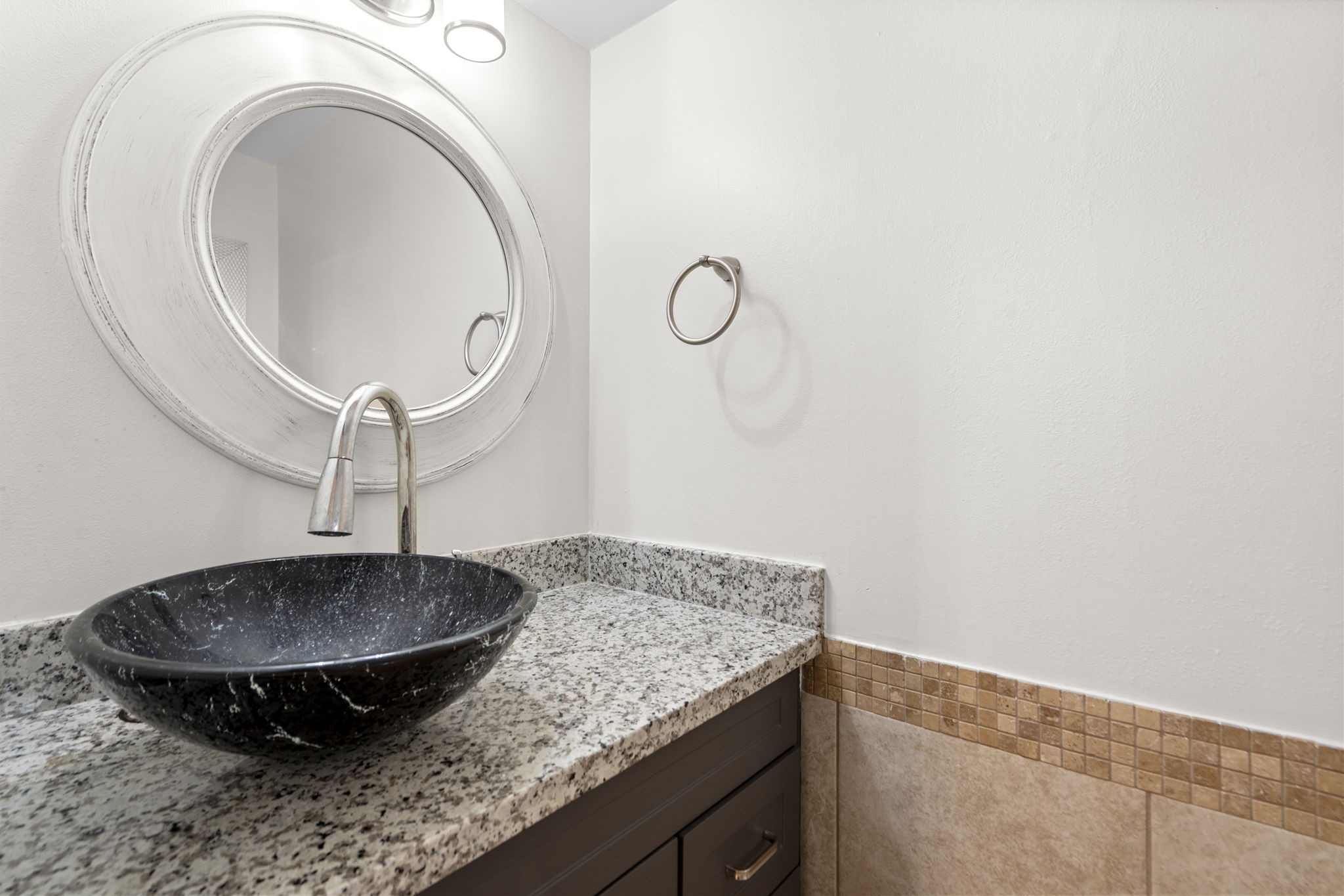 1271 Witte Road, Unit 26 Houston, TX 77055 - Photo 8 of 27 a bathroom with a granite countertop sink a mirror and vanity