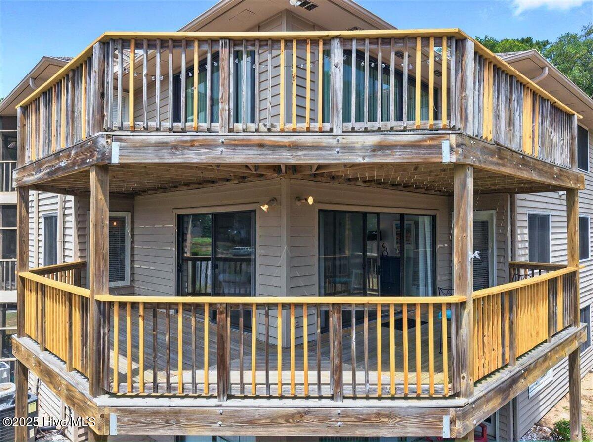 816 Colony Place, Unit D Sunset Beach, NC 28468 - Photo 27 of 51 Second Floor Deck